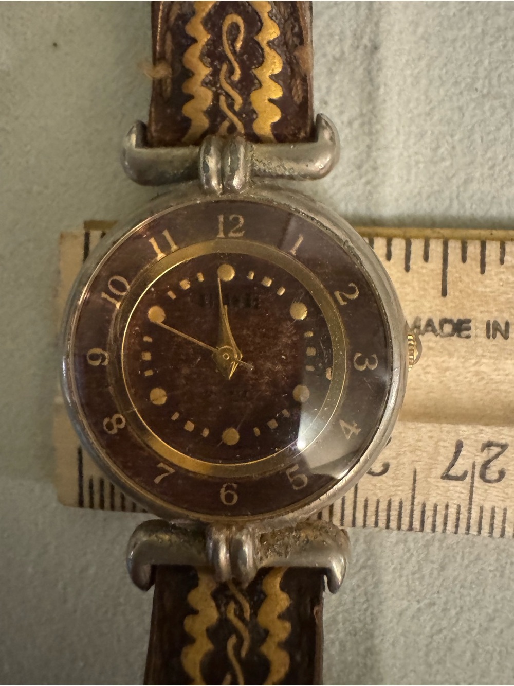 Women’s Brown Leather Watch with Decorative Dial Accents - Picture 10 of 16